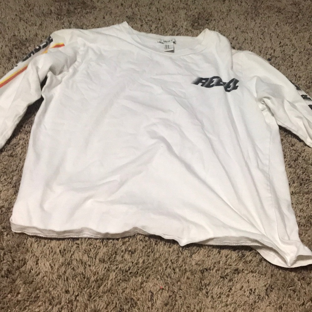 White shirt with yellow and orange strips